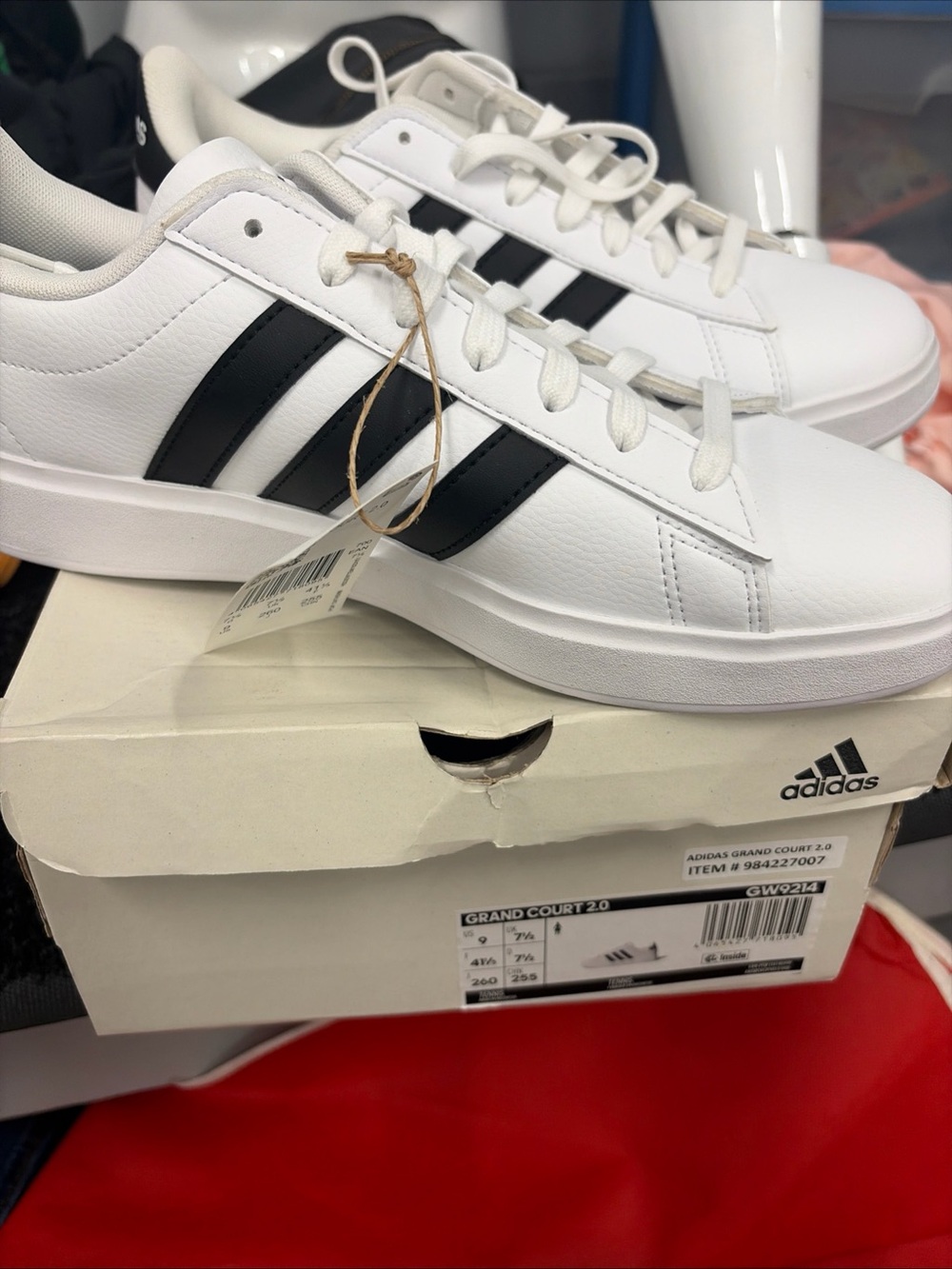 adidas Women’s White Sneakers with Black Three-Stripes